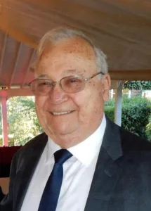 KENNETH HUGGINS